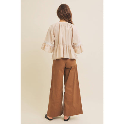 BABYDOLL PEPLUM TOP WITH FLOUNCE SLEEVES AND DELICATE TRIMS