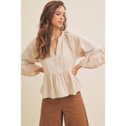 BABYDOLL PEPLUM TOP WITH FLOUNCE SLEEVES AND DELICATE TRIMS
