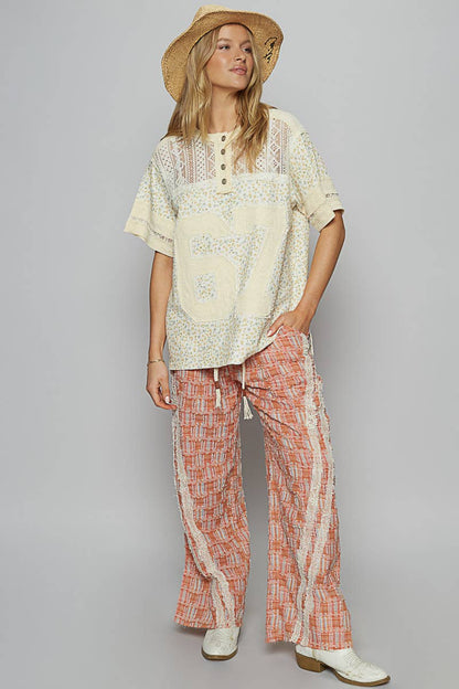 Round neck short sleeve floral print knit top