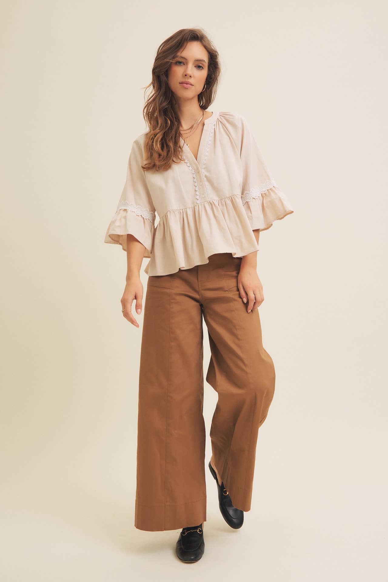 BABYDOLL PEPLUM TOP WITH FLOUNCE SLEEVES AND DELICATE TRIMS