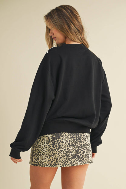 BOW APPLIQUÉ SWEATSHIRT