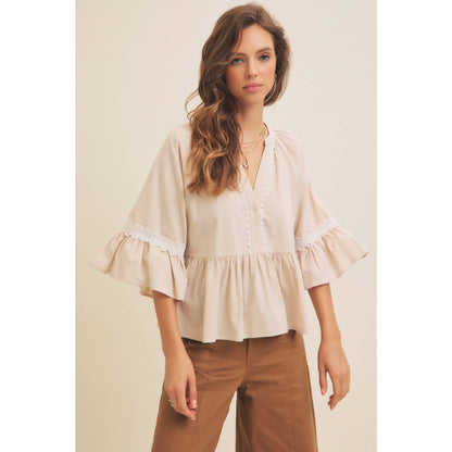 BABYDOLL PEPLUM TOP WITH FLOUNCE SLEEVES AND DELICATE TRIMS