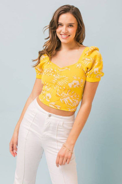 A jacquard sweater knit top